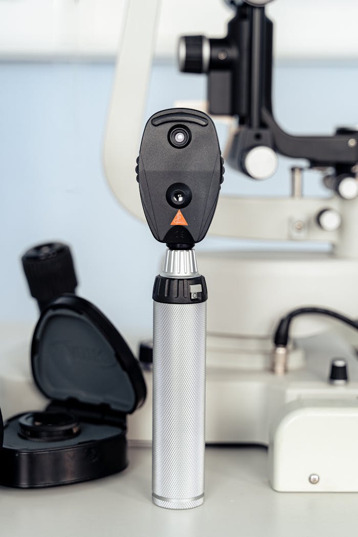 Close-up of a professional ophthalmoscope on a table in an eye clinic, used for eye examinations.